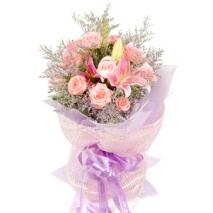 rose and lilies in bouquet